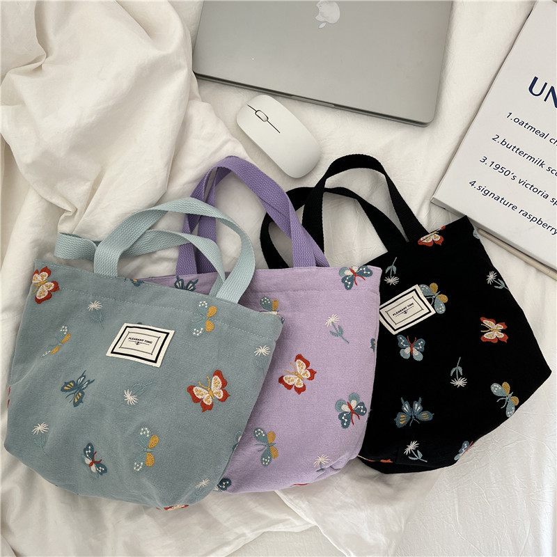 11262 Sky Blue Butterfly embroidered hand-held bag, Korean-style artistic and cute bento bag, small cloth bag for students to carry to work full figure