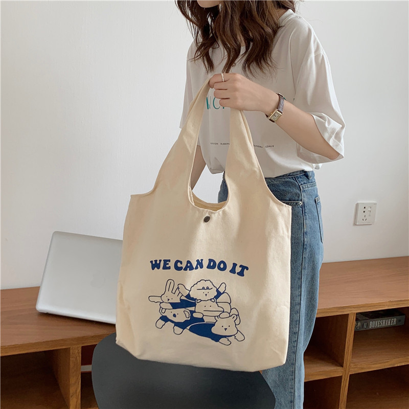 15134 canvas bag for women, Korean version, large-capacity underarm single-shoulder bag, simple and cute cartoon student handbag wholesale Specification drawing