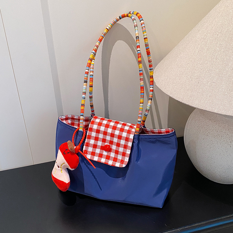 A portable and versatile denim mint small handbag with bottom straps on both sides - a large-capacity single-shoulder commuting bag details Picture