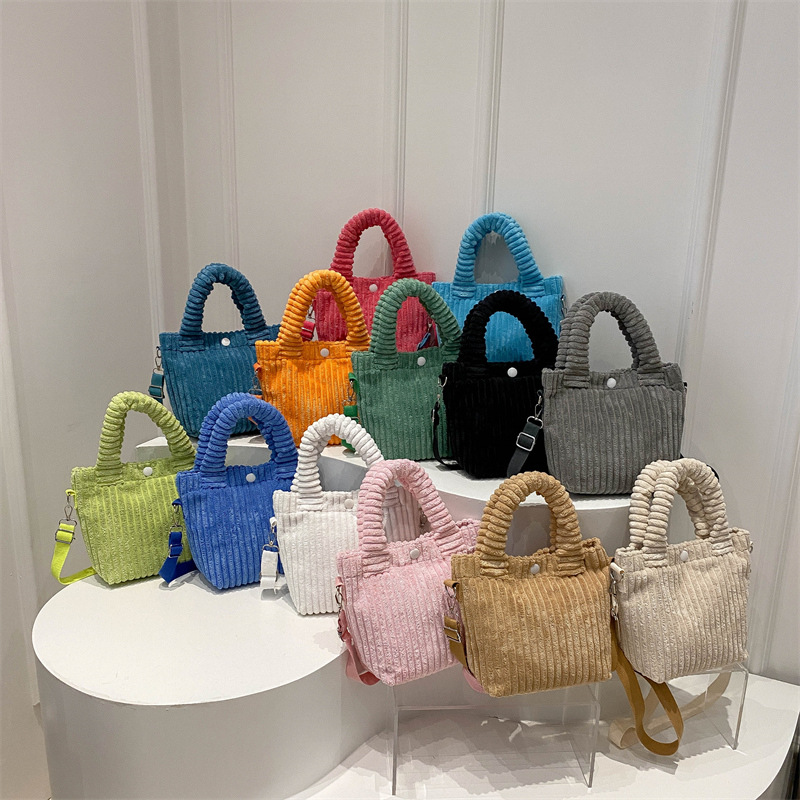 Simple bucket bag 2024 winter new style Korean ins corduroy single-shoulder crossbody bag texture hand-held women's bag full figure