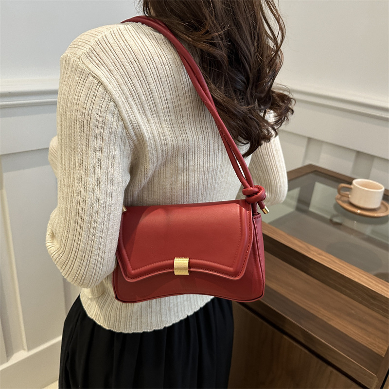 A stylish and simple hand-held baguette bag for women's 2024 winter collection, an Instagram niche single-shoulder bag Specification drawing