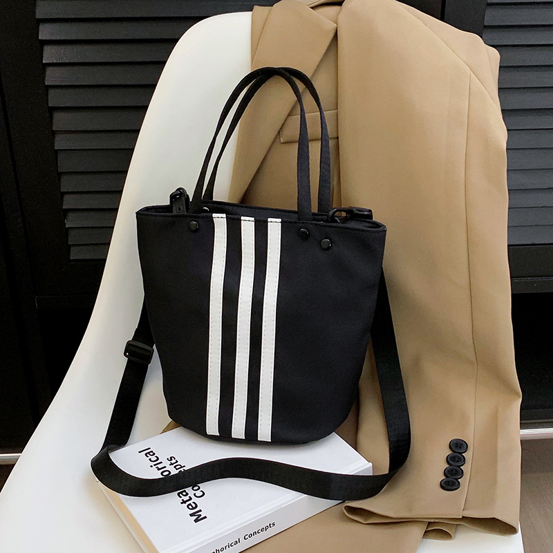 2025 New niche three-bar handbag, large-capacity single-shoulder bag, casual and versatile bucket Oxford cloth crossbody bag Specification drawing