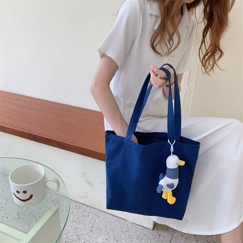 06292 Artistic and retro single-shoulder bag, solid color and simple hand-carried shopping bag, student class canvas bag, large capacity details Picture