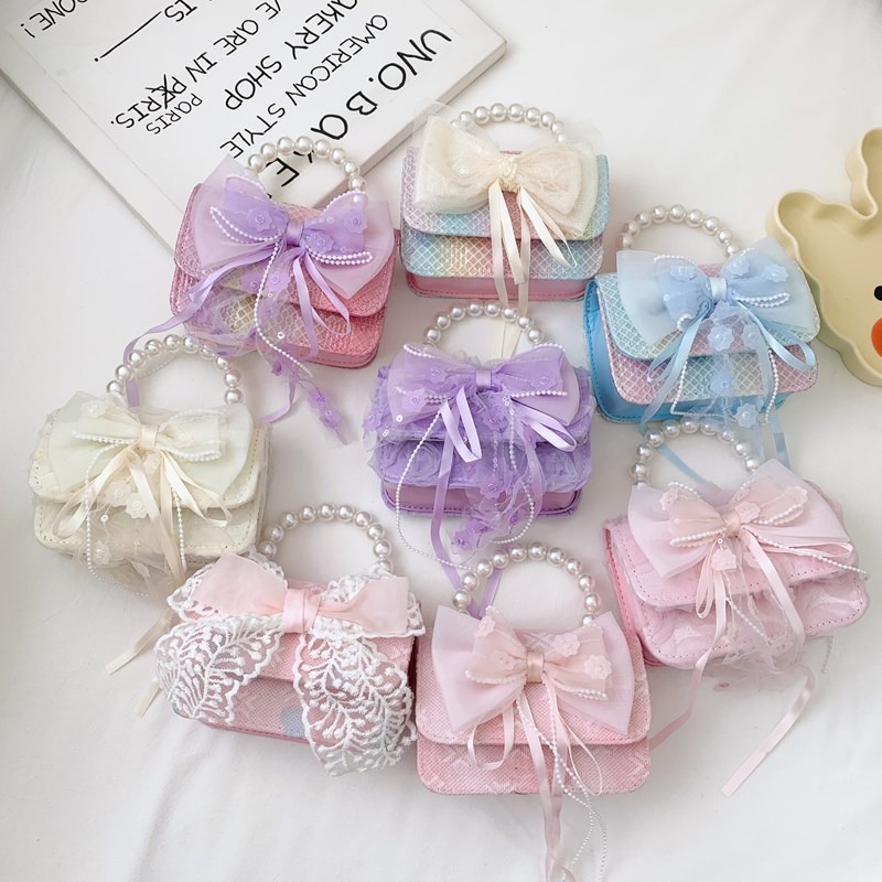New children's bag, fashionable pearl handbag, cartoon cute bow shoulder bag, chain crossbody small bag details Picture