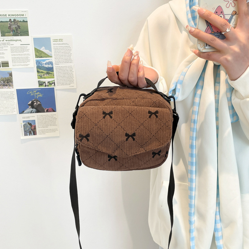 Sweet bow check single-shoulder armpit crescent bag 2025 Summer New simple and casual large capacity handbag full figure