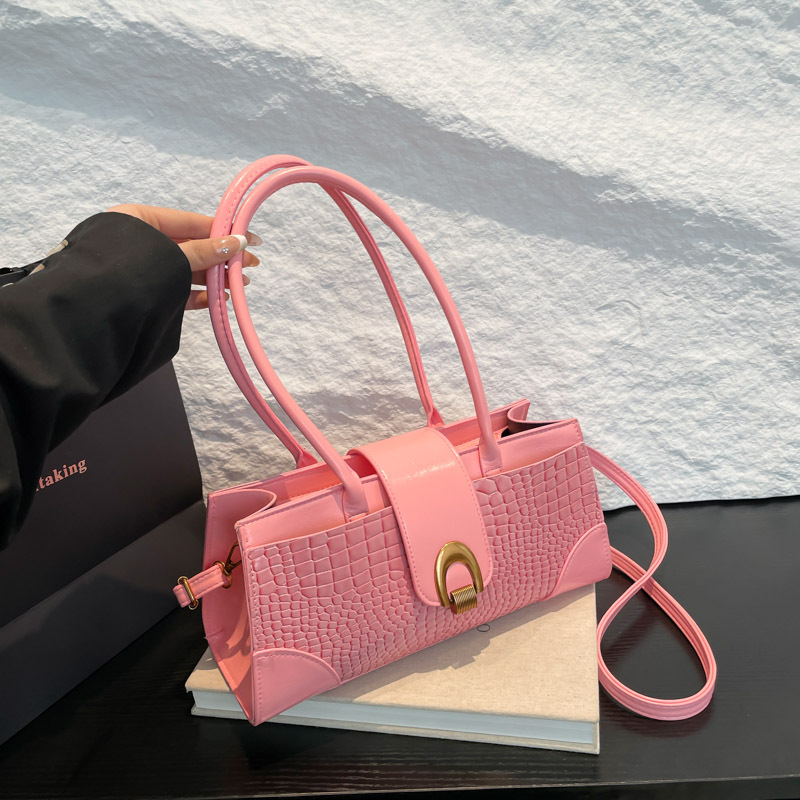 The new Spring/Summer 2025 urban commuter women's handbag, hand-held shoulder crossbody bag, large capacity, elegant, simple and versatile bag full figure