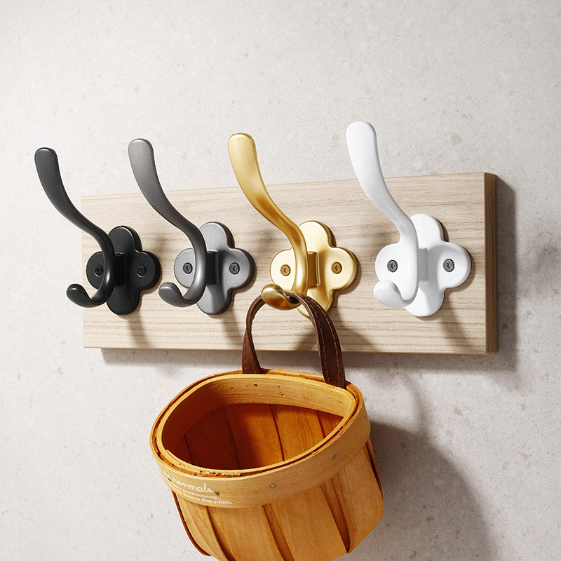 Modern and simple shoe cabinet and wardrobe hooks, Nordic entrance dolphin coat hooks, single metal black creative coat hooks Application Scenario