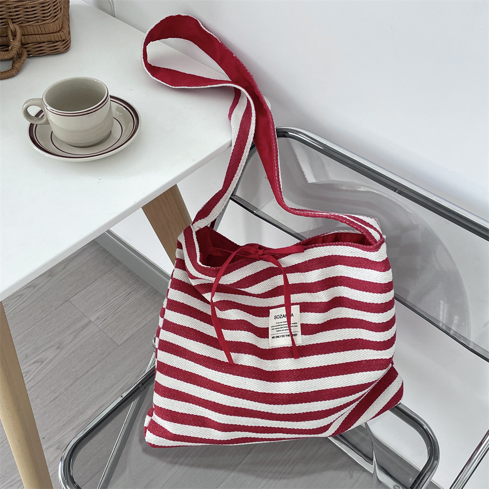 53221 Casual striped canvas bag for women, 2025 New large-capacity commuter tote bag, double-sided shoulder, single-shoulder crossbody Application Scenario