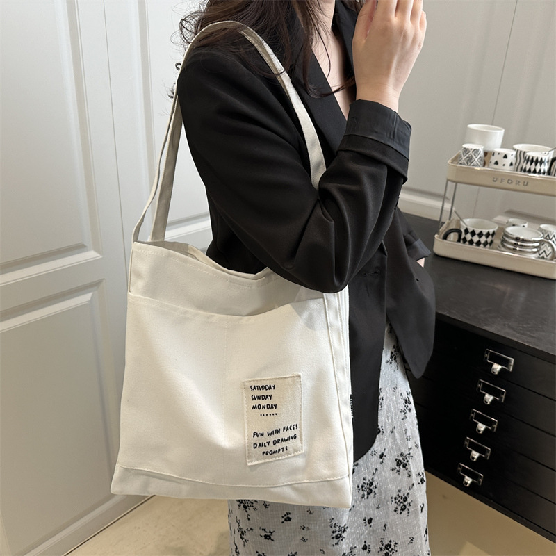 Crossbody women's bag 2025 new style casual canvas single-shoulder bag Cross-border trend Student tutorial bag large capacity tote bag details Picture