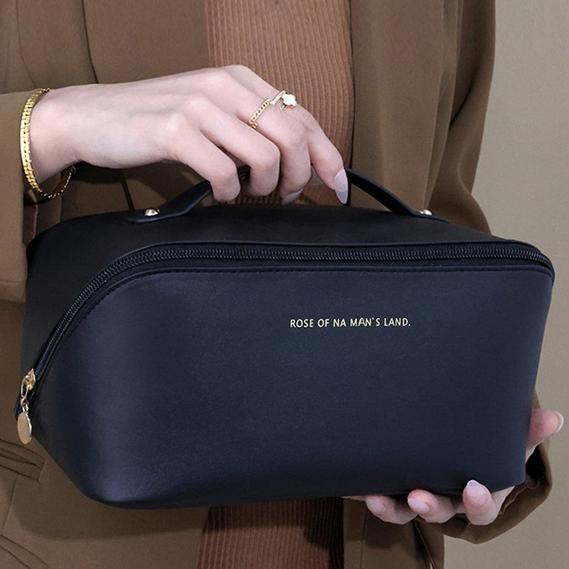 Customized fashionable pu pillow bags, portable travel storage bags, large-capacity toiletry bags, hand-enhanced appearance makeup bags full figure