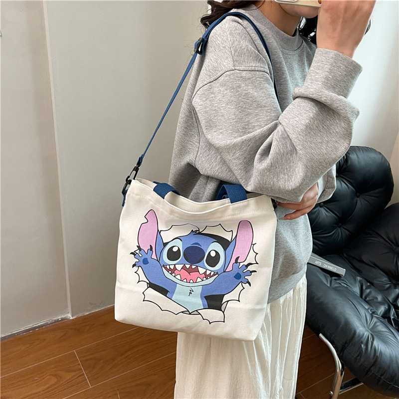 Wholesale of cross-border canvas bags for women, 2025 new style simple and fashionable cartoon printed single-shoulder bags and student tote bags details Picture