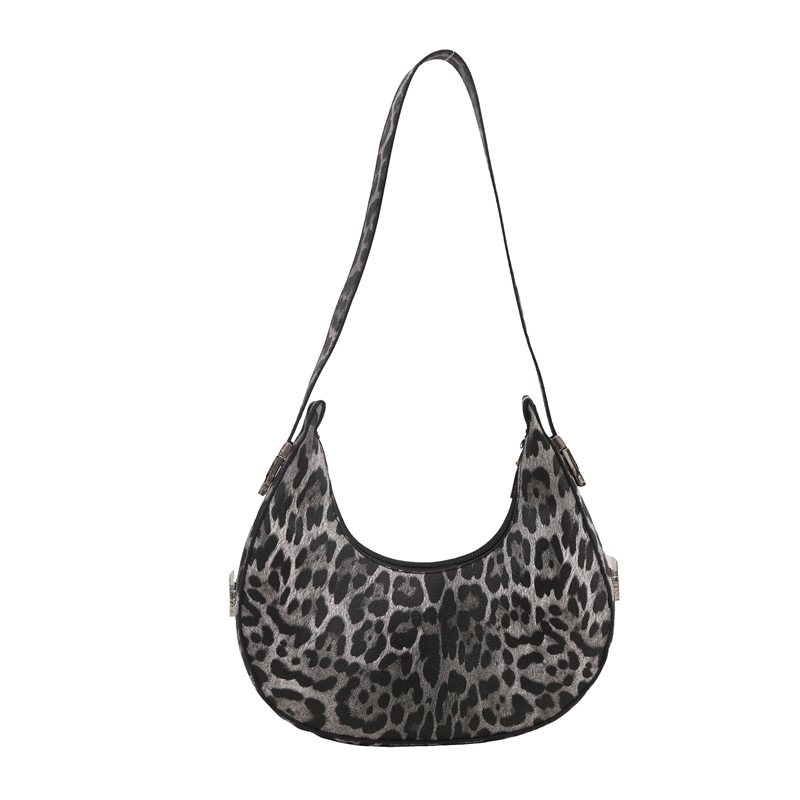 Crescent Moon underarm bag, a trendy new women's bag, casual 2025, Korean spring style, unique and elegant, hand-held single-shoulder bag Item Picture