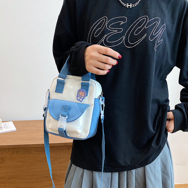 Korean style fashionable color-blocking hand-held small bag for women, 2021 new trendy single-shoulder crossbody women's bag, simple and individual small cloth bag Specification drawing