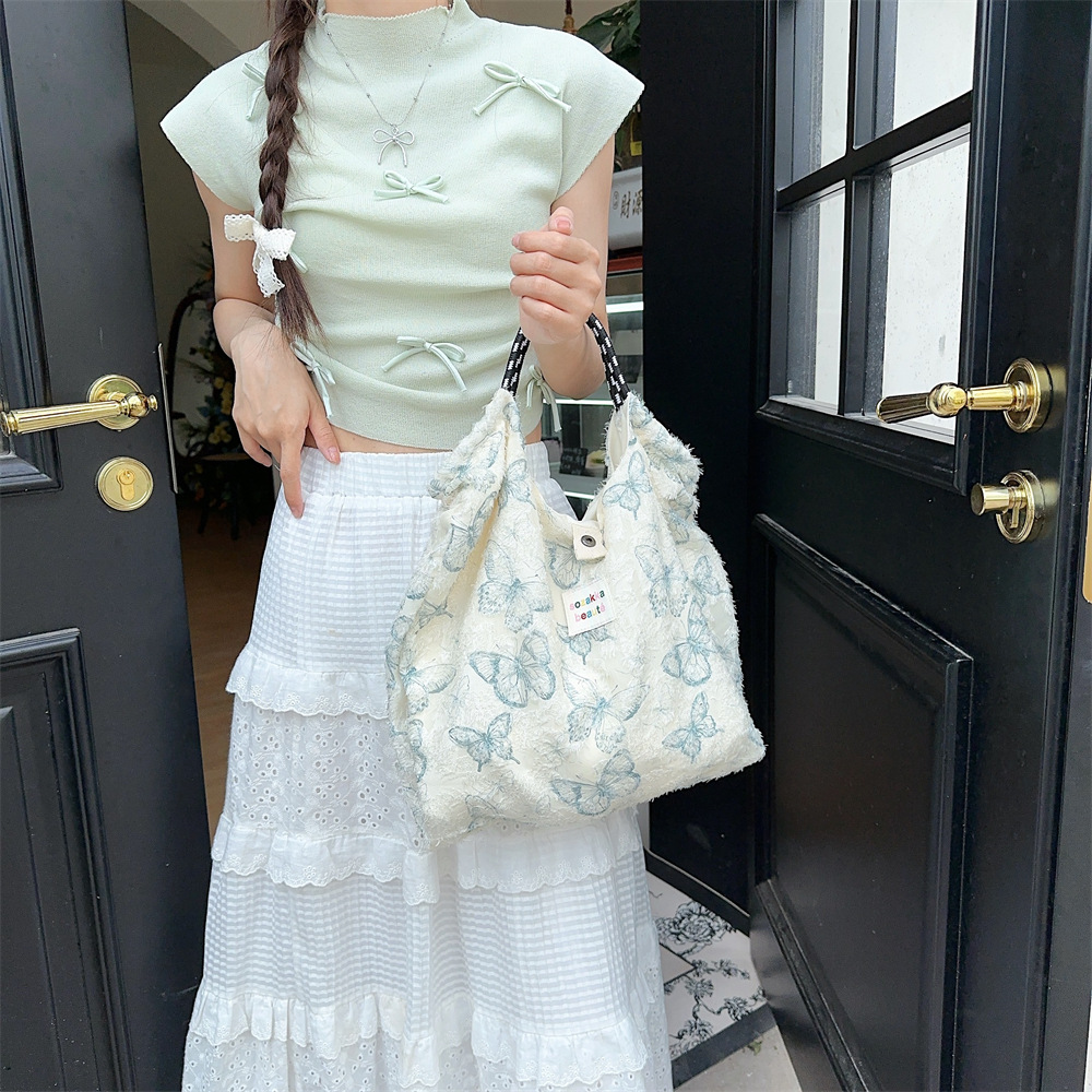 44181 ins large-capacity lace butterfly canvas tote bag for commuting to work and organizing miscellaneous items details Picture