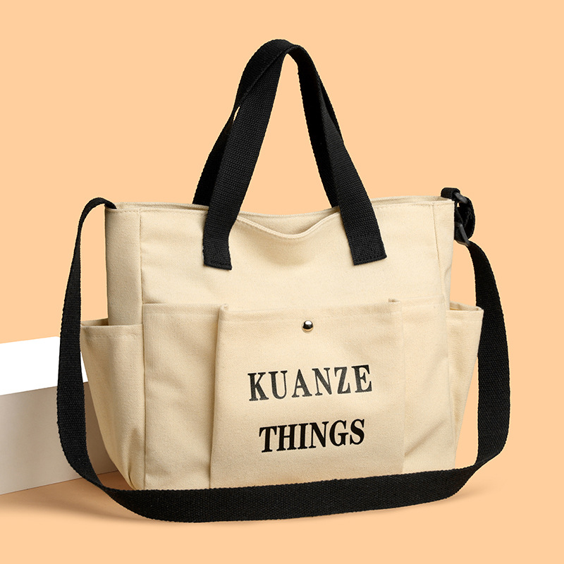 Cross-border letter-printed canvas single-shoulder bag, women's handbag, large-capacity commuter tote bag, student class bag full figure