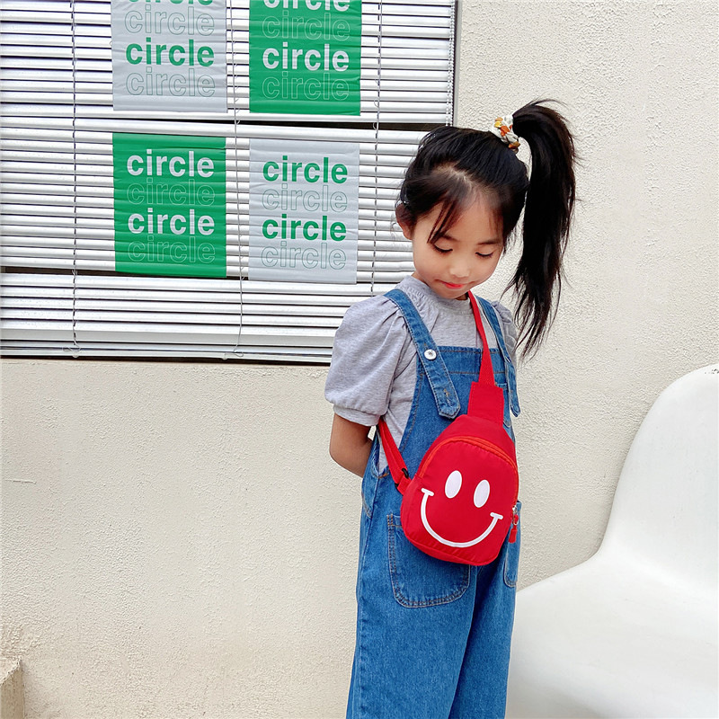 Cute children's waist bag, Korean-style smiling face, trendy and fashionable chest bag, crossbody bag, trendy cartoon coin purse for boys and girls details Picture