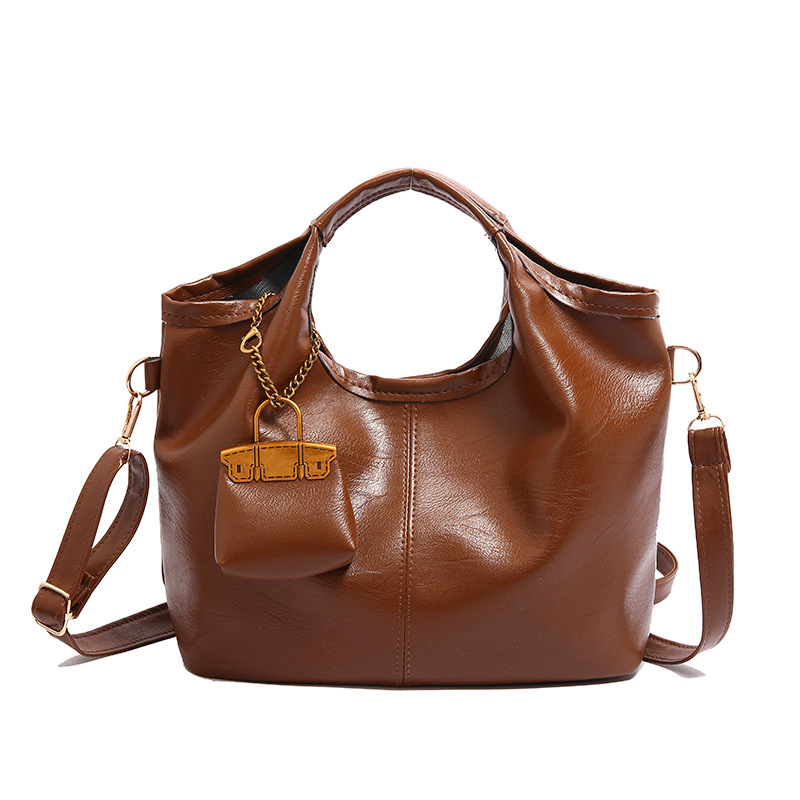 Autumn and winter retro fashion women's 2024 new large-capacity casual commuting solid-color mother-and-child hand-held crossbody tote bag Item Picture