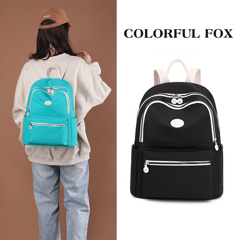 Colorful Fox's new women's backpack, large-capacity water-resistant travel backpack, and fashionable color-blocking campus schoolbag full figure