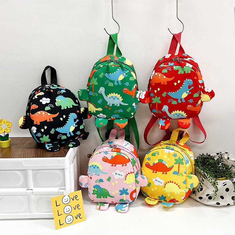 New kindergarten schoolbag, children's cartoon dinosaur small backpack, Korean version color-blocking outdoor lightweight backpack for boys and girls full figure