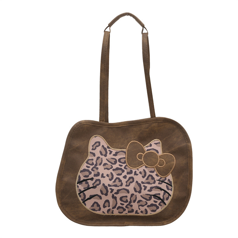 The cross-border trend: a simple, multi-functional, large-capacity single-shoulder crossbody bag with leopard print patchwork imitation denim dyeing Item Picture