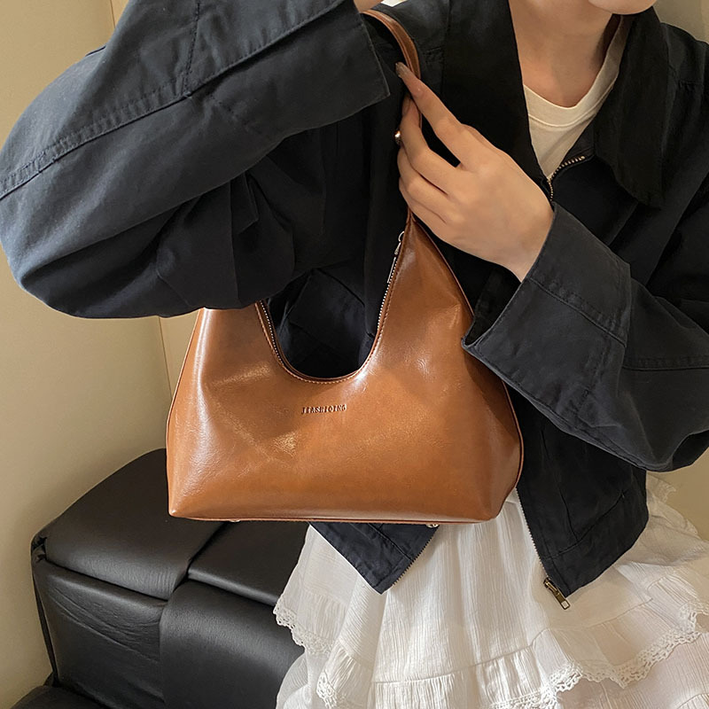 A high-quality and niche handbag for women in spring 2025, a versatile single-shoulder underarm bag and a fashionable hand-held dumpling bag details Picture