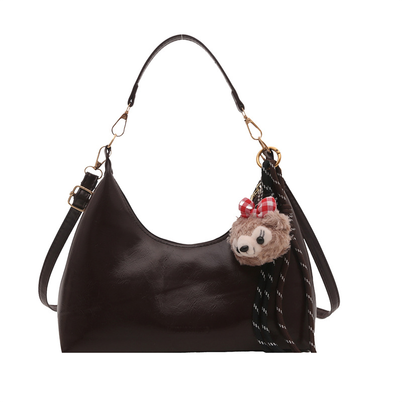 This 2024 winter Korean-style, elegant and simple single-shoulder crossbody bag features a unique, retro, fashionable and niche design. It is a crescent-shaped bag under the armpits Item Picture