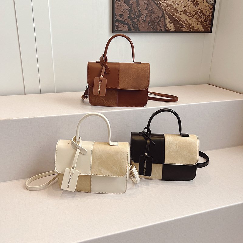 The new 2024 winter collection features a niche design with color-blocking and patchwork hand-held small square bag, a Korean-style fashionable, simple and retro single-shoulder bag Application Scenario