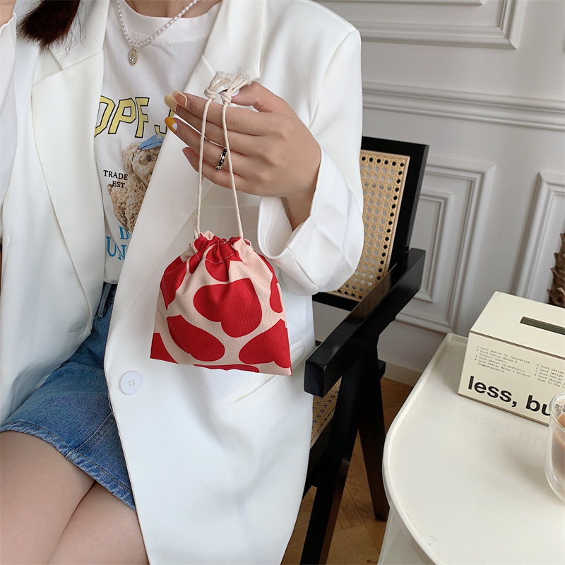 211191 Retro corduroy heart-shaped storage bag with drawstring closure, cosmetic bag, miscellaneous storage bag, small size full figure