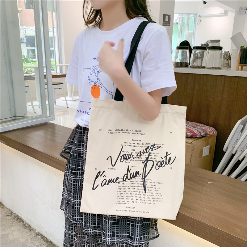 E148 canvas bag ins Midnight Paris Movie peripheral single-shoulder girl student fresh bag wholesale, fashionable and versatile full figure