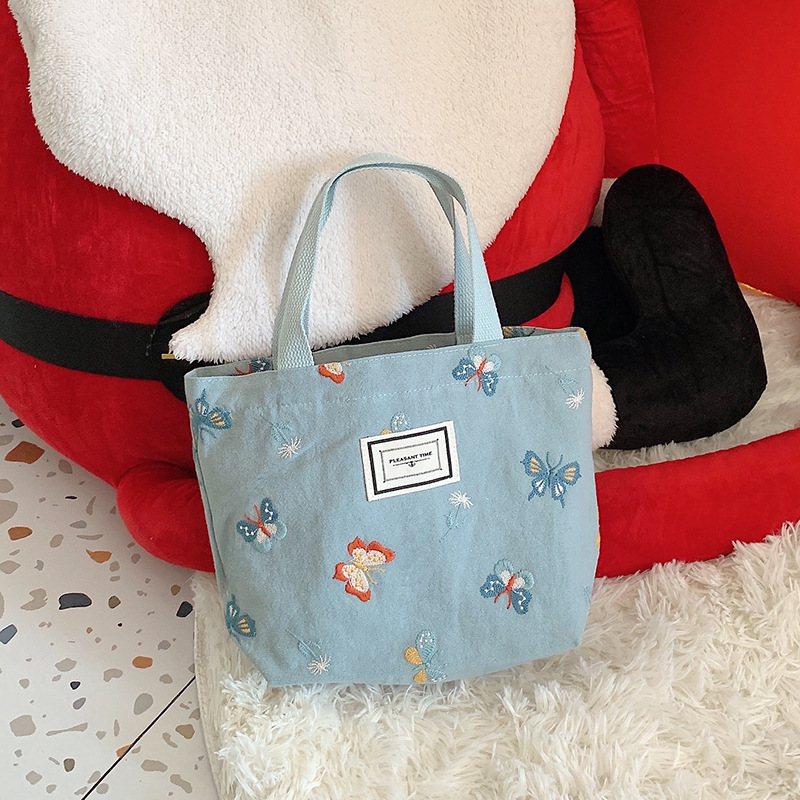 11262 Sky Blue Butterfly embroidered hand-held bag, Korean-style artistic and cute bento bag, small cloth bag for students to carry to work details Picture