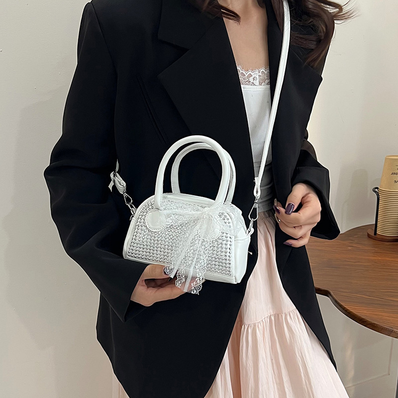 Diamond-encrusted women's 2025 new large-capacity water diamond hand-held pillow bag, simple and elegant texture, single-shoulder crossbody bag details Picture
