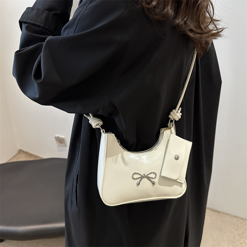 Bow underarm bag for women, 2024 new style simple commuter bucket bag, high-end texture, single-shoulder crossbody bag, trendy details Picture