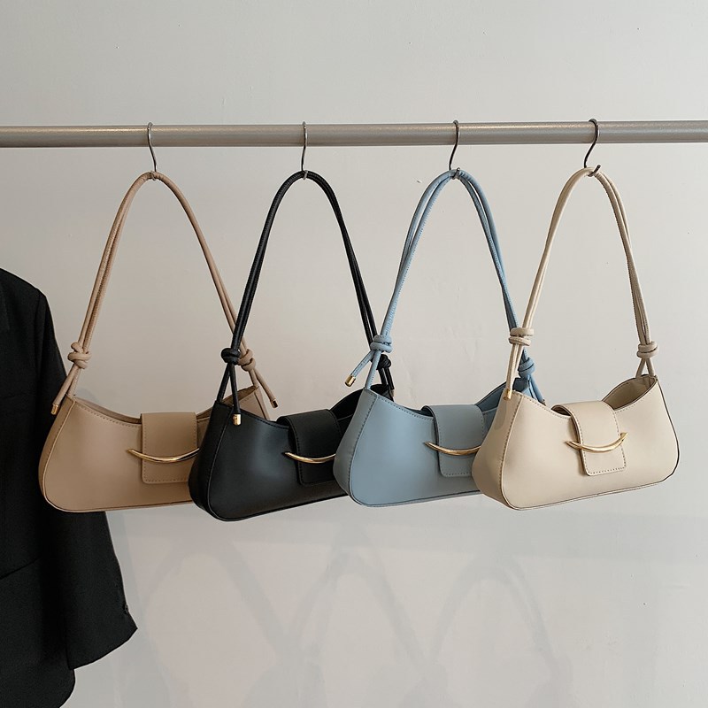 The new women's bags for Spring 2025 are fashionable and trendy. The underarm bag features a French niche design and the single-shoulder bag is stylish and stylish Application Scenario