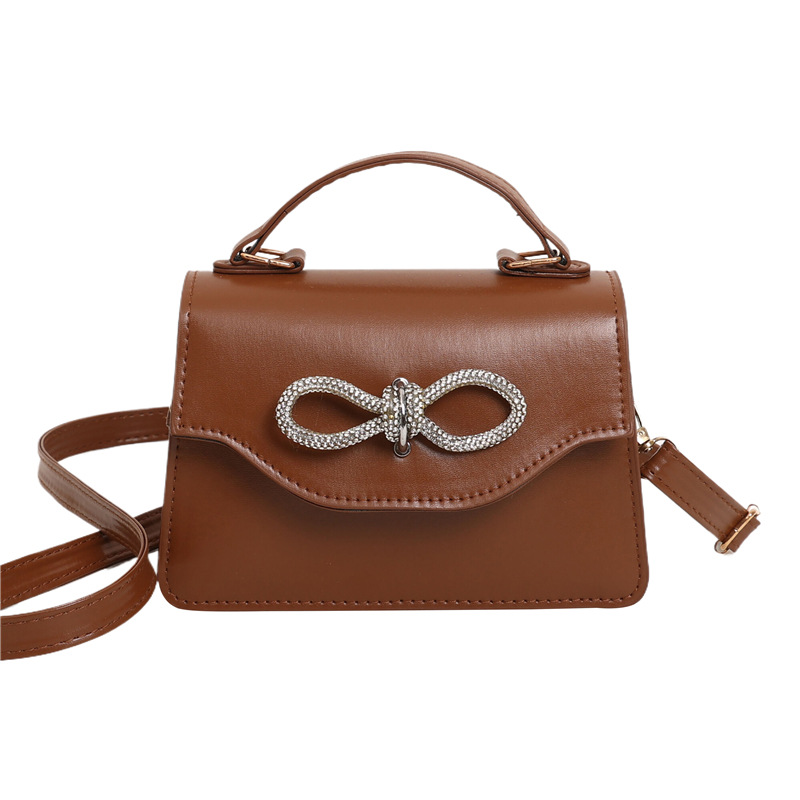 A stylish Korean-style simple solid color bow with stitching, casual and casual, crossbody single-shoulder hand-held small square women's bag Item Picture