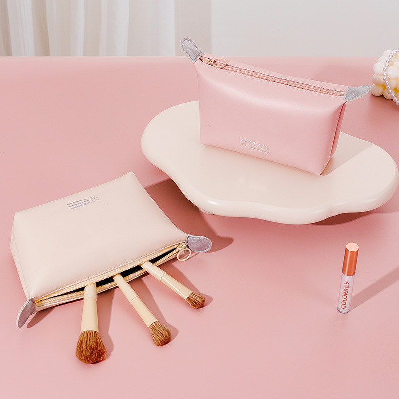 Runhui PU waterproof makeup Bag, Heart-stirring dumpling bag, convenient hand-held storage bag, candy-colored makeup bag, large capacity details Picture