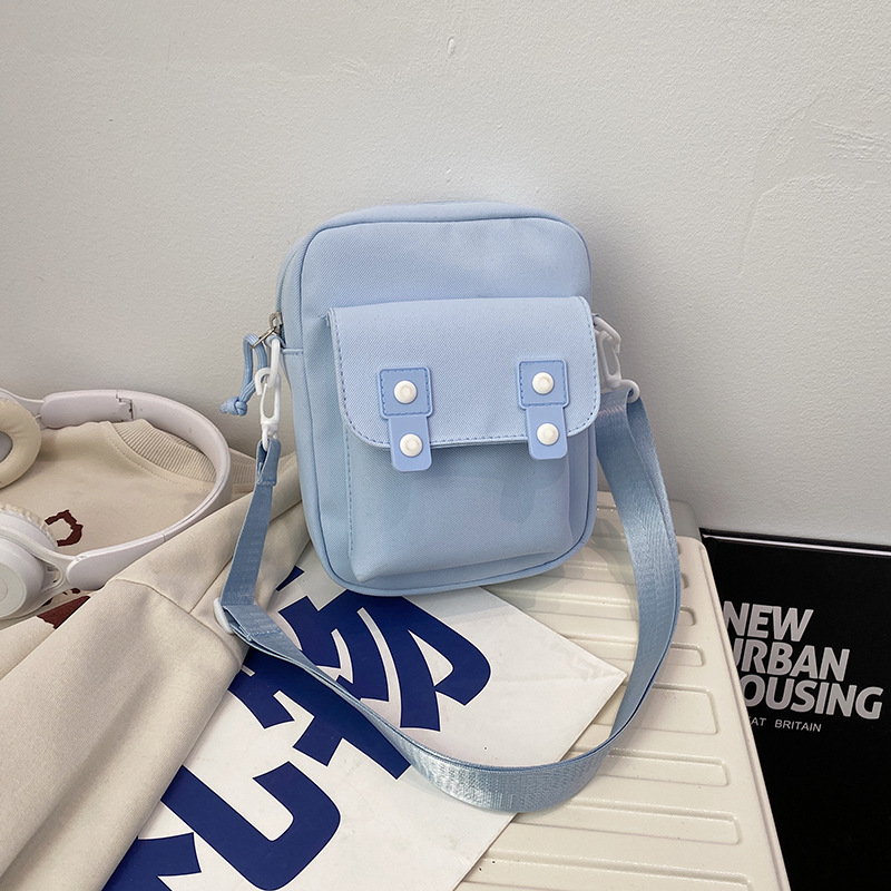 The new solid-color small cloth bags for autumn are cute and simple. Travel bags, student single-shoulder bags, mobile phone bags, small crossbody bags and crossbody bags details Picture