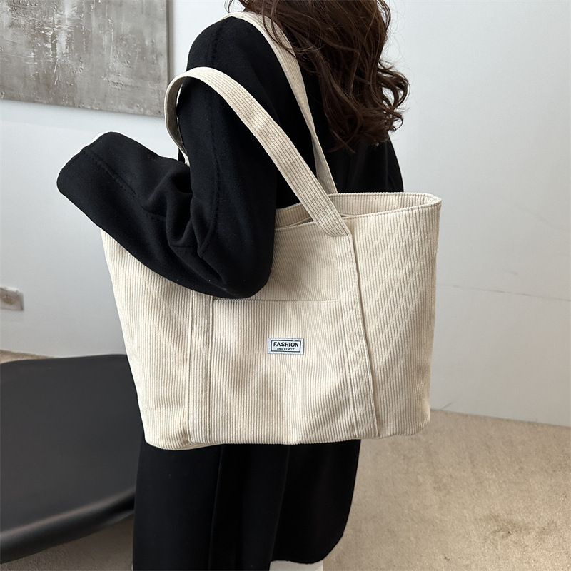 Large-capacity corduroy fabric bag for women, 2024 new style college student single-shoulder hand-carry large bag, commuter bag, tote bag details Picture