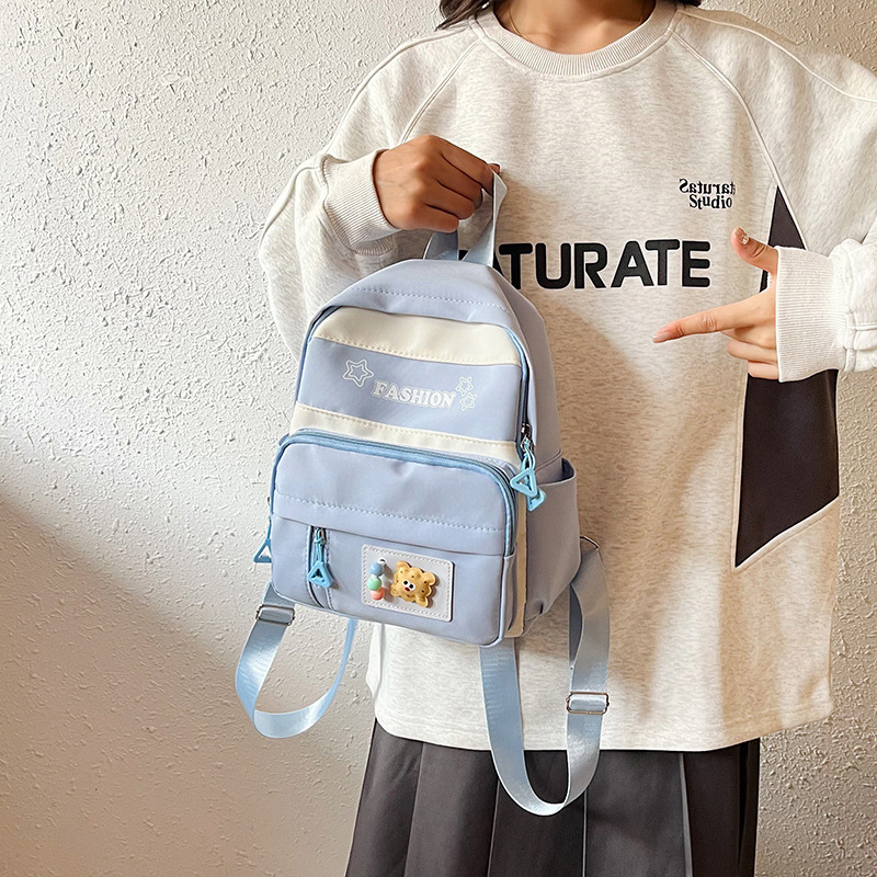 The new spring 2025 color-blocking and patchwork backpack is cute, with a large capacity and a high-quality single-shoulder crossbody bag, making it a cross-border trend Specification drawing