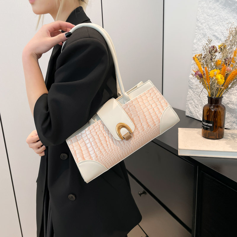 The new Spring/Summer 2025 urban commuter women's handbag, hand-held shoulder crossbody bag, large capacity, elegant, simple and versatile bag details Picture