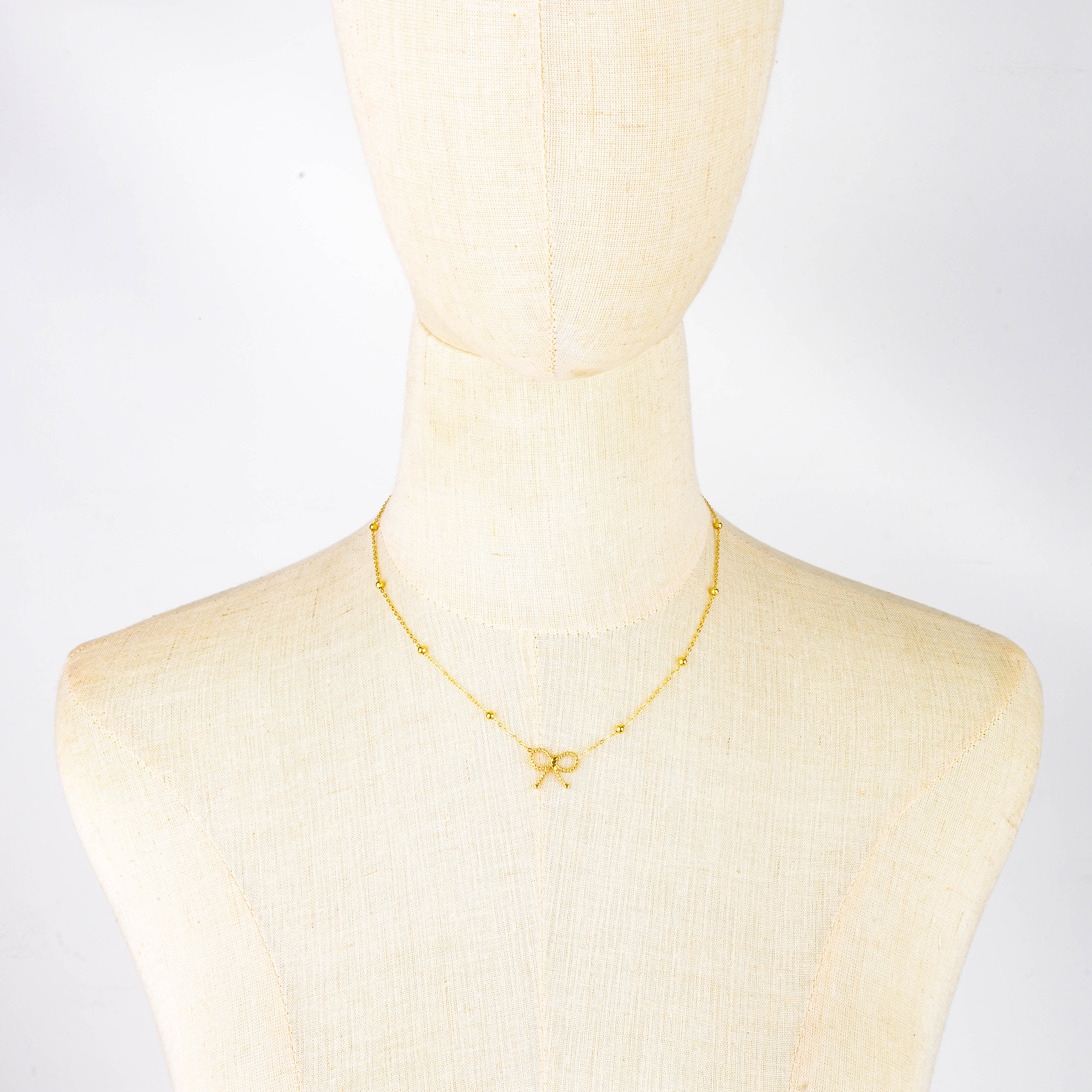 New titanium steel niche design cross-border non-fading cute hollowed-out bow pendant necklace women's collarbone chain accessory