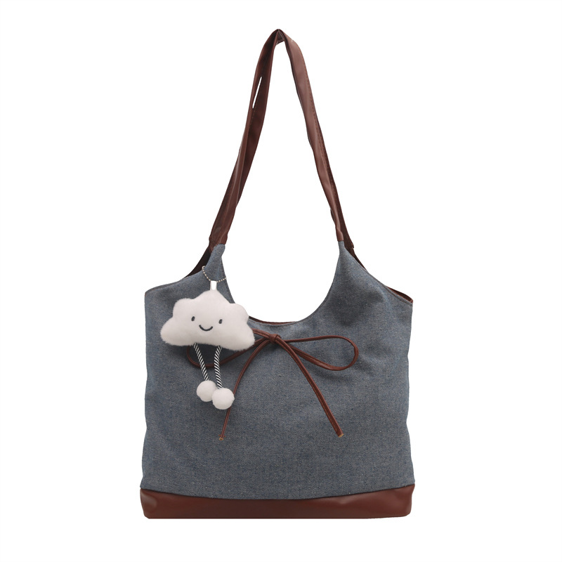 New large-capacity denim patchwork handbag, commuter tote bag, simple and laid-back style, versatile commuter crossbody bag Item Picture