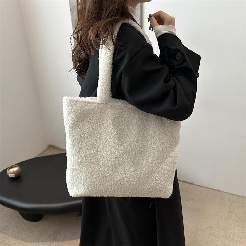 Winter ladies' hand-held stylish plush small bag, a new 2024 trendy and fashionable commuting all-in-one furry handbag for women details Picture