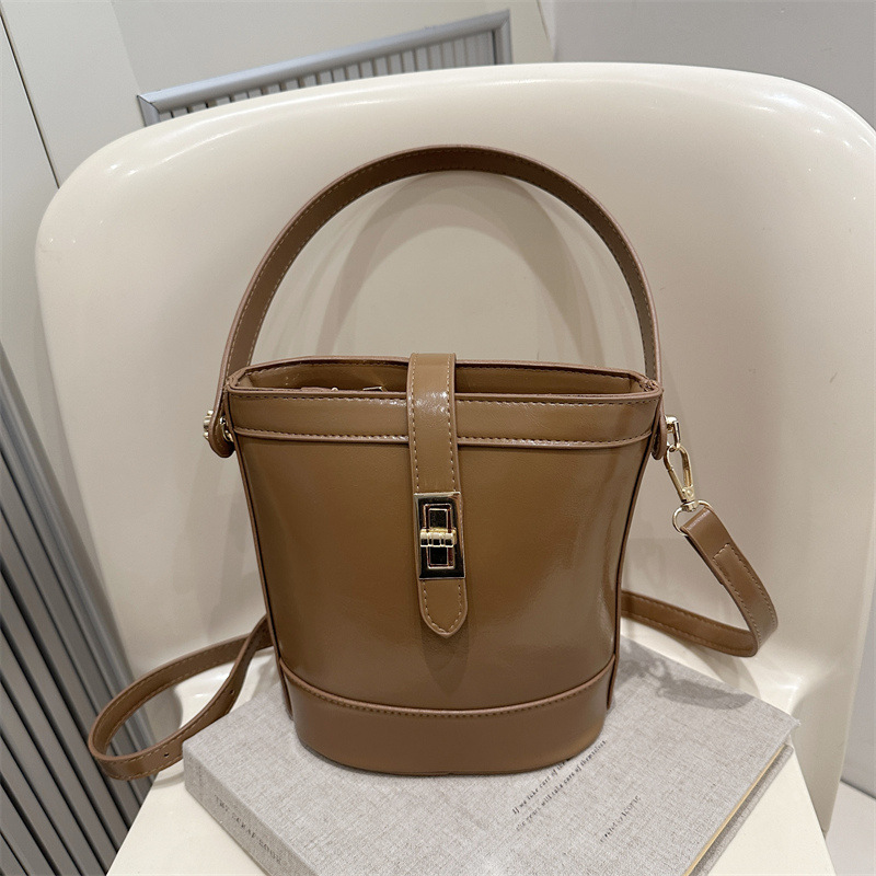 Spring new women's bag, retro style casual bucket bag, texture hand-held small bag, cross-border fashionable single-shoulder crossbody bag full figure