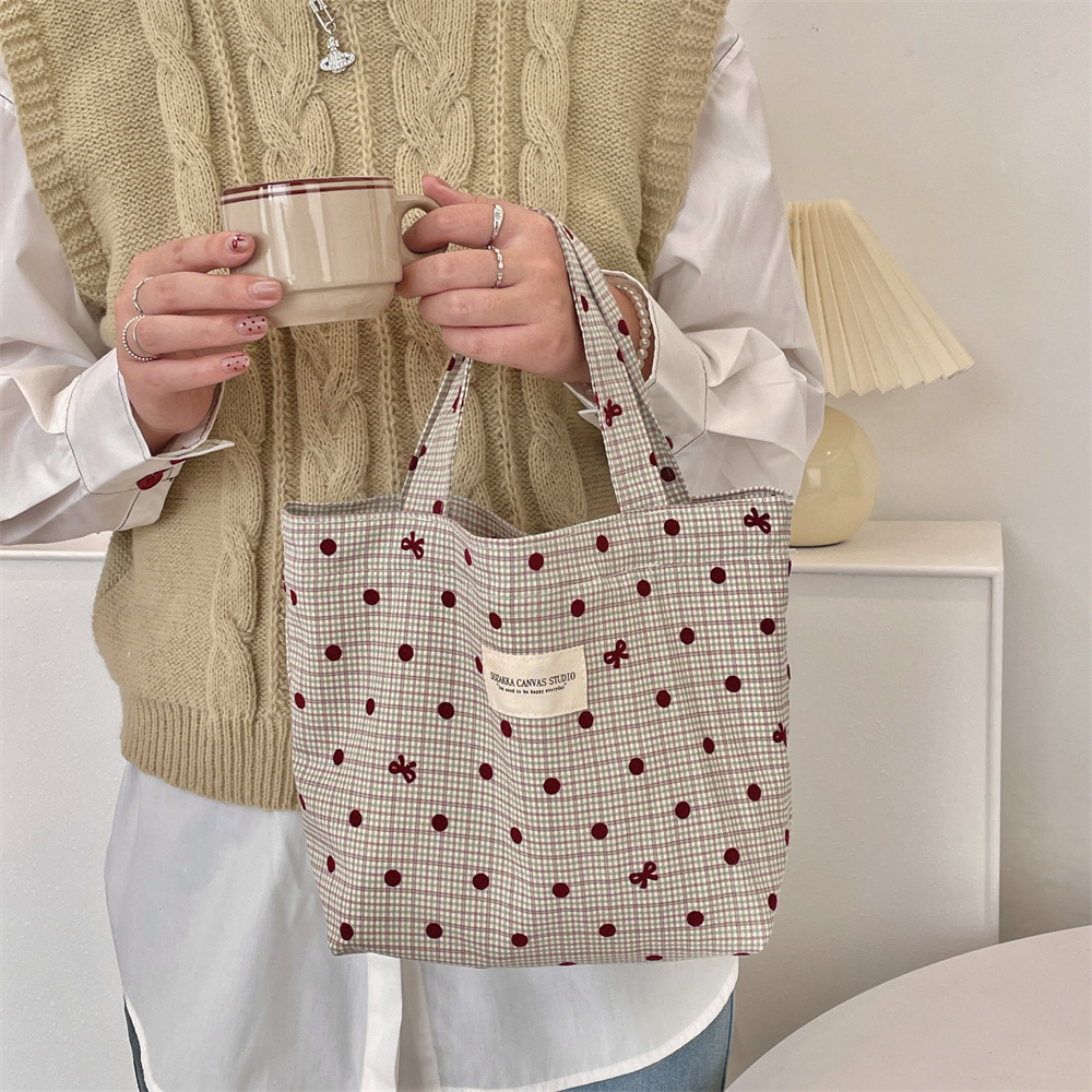 410182 Autumn New style bento bag, student hand-held bag, large-capacity portable small cloth bag for commuting and going out Application Scenario