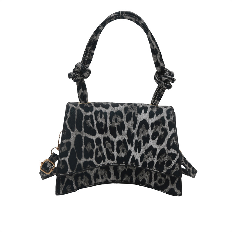This niche design handbag exudes a sense of sophistication. The leopard print single-shoulder crossbody bag is a fashionable and versatile commuter underarm bag for women Item Picture