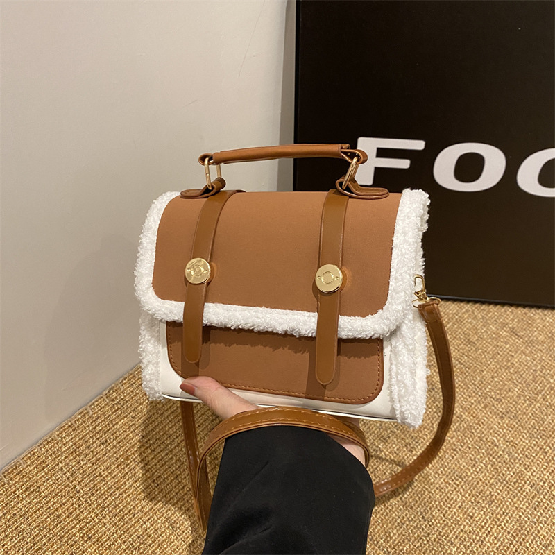 The Maomao patchwork bag is a retro and simple solid-color commuter women's bag for 2024, a new casual and retro women's hand-held shoulder bag full figure