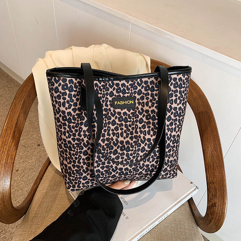 This year, the 2024 new large-capacity school commuting bag, the leopard print bag, and the stylish single-shoulder tote bag with a patchwork design are all the rage for women full figure