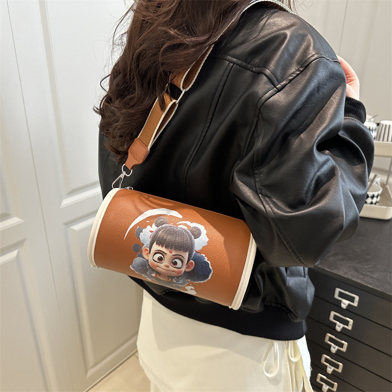 The new Spring 2025 cartoon-printed cylindrical bag with large capacity and wide shoulder strap, single-shoulder crossbody bag, is crossing the cross-border trend details Picture