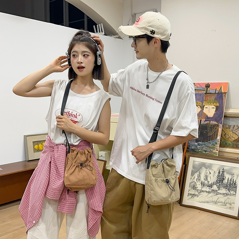 Summer men's and women's nylon crossbody bag, mini drawstring bucket bag, light and casual, ins style single-shoulder crossbody phone bag Specification drawing