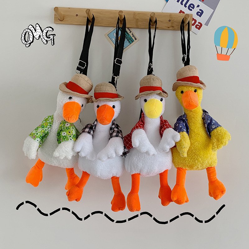 Cute and ugly duck-shaped plush toy in a vest, an Instagram influencer straw hat doll, and a birthday gift for the "Cheer Up Duck Girl" full figure